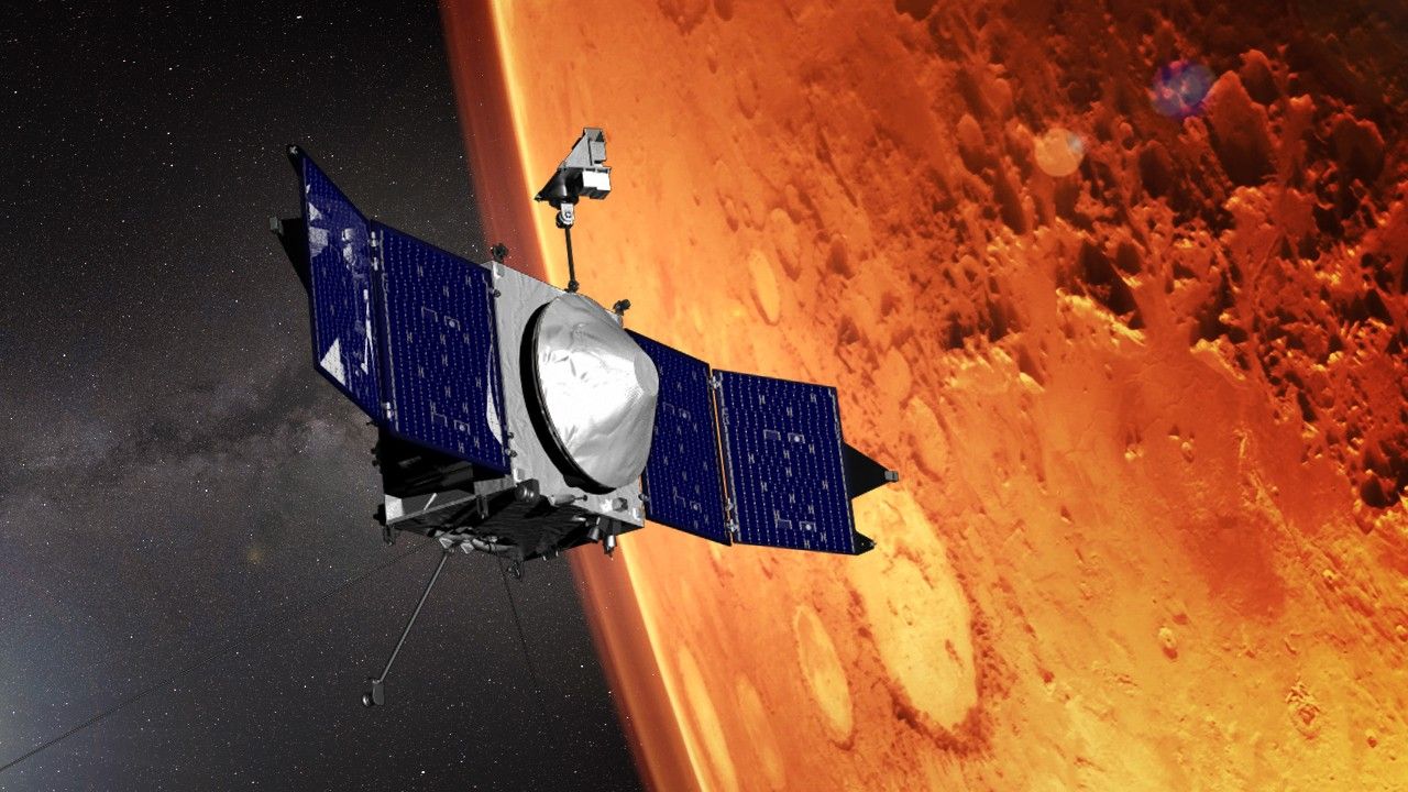 Conceito artístico mostra a espaçonave MAVEN (Mars Atmosphere and Volatile EvolutioN) da NASA próxima a Marte