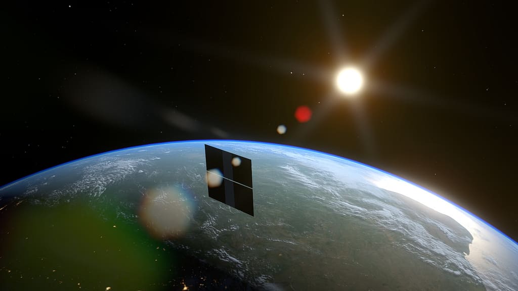 Uma ilustração do satélite da Starcloud orbitando a linha do terminador — a linha que separa o dia da noite. Imagem cortesia da Starcloud/NVIDIA.