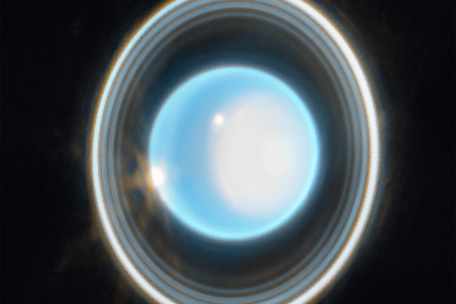 Imagem ampliada de Urano capturada pelo Telescópio Espacial James Webb em fevereiro de 2023, mostrando os anéis do planeta com detalhes impressionantes no infravermelho.